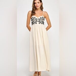 New with tags Stunning Cream Maxi Dress with Black design size M